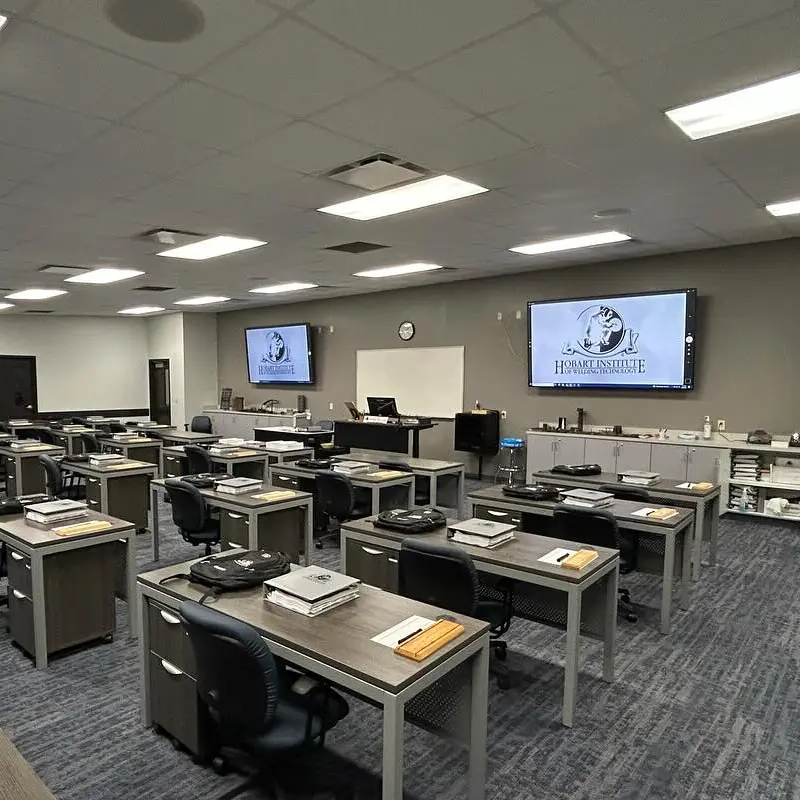 inside the classroom showing desks and books