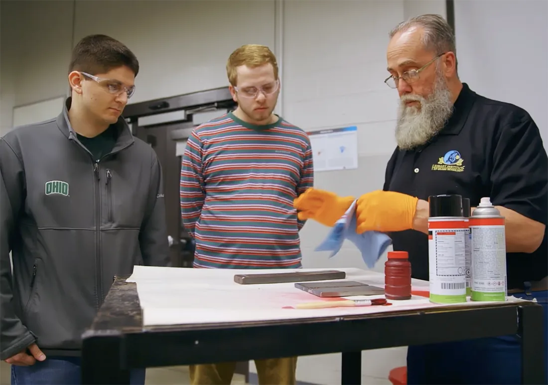 instructor showing inspection techniques